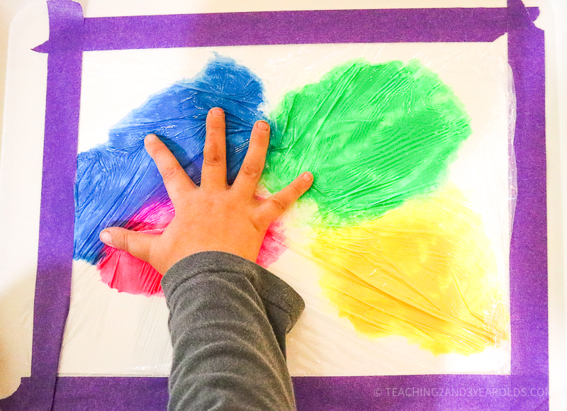 Toddler No Mess Painting Activity with Plastic Wrap